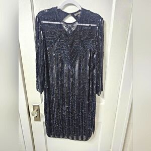 Vintage Carolyne Barton black evening gown with sequence and iridescent beads.